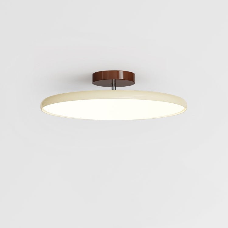 Front view of the beige adjustable flush mount xome ceiling light