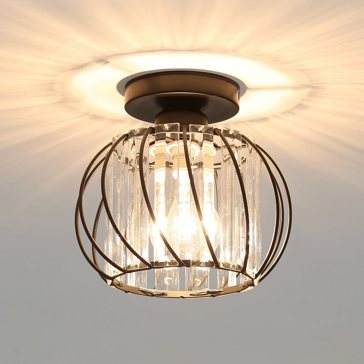 Modern black crystal cage flush mount yilo ceiling light casting a dramatic starburst pattern