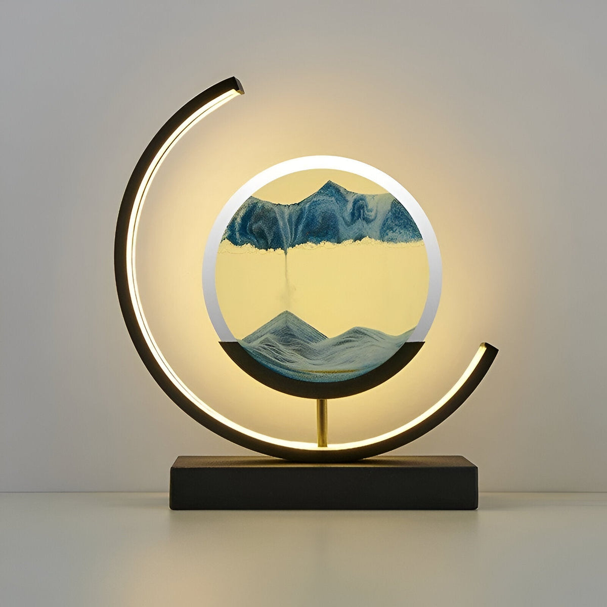 Black youj circular LED moving sand art lamp featuring a serene blue sand landscape