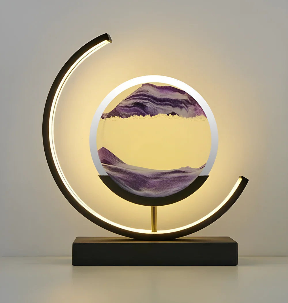 Modern LED moving sand art youj table lamp featuring a black circular frame and flowing purple sand